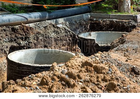Work On The Reconstruction And Installation Of Wells And Pipes Of The Sewage System, A Storm Water S