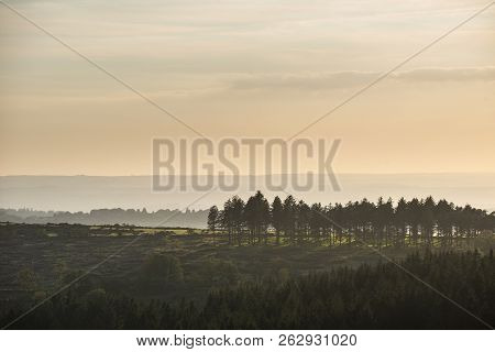 Beautiful Autumn Sunset Landscape Image Of View From Leather Tor In Dartmoor National Park