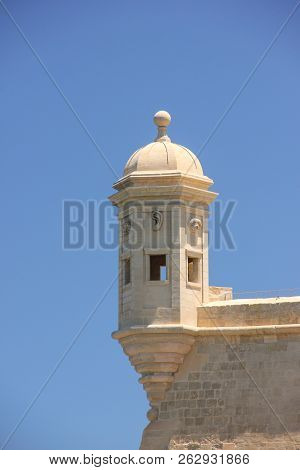 La Guardiola Tower In Senglea, Malta. Three Cities Most Attraction Place On Backgound Of Clear Blue 