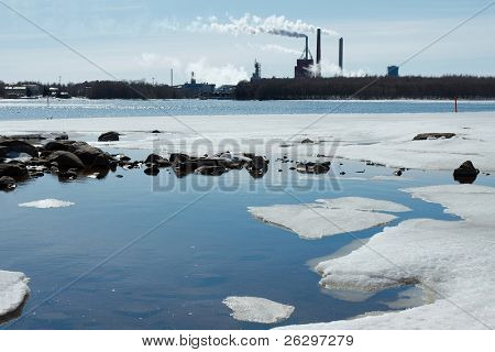 Rökning industrianläggningar och smältande is