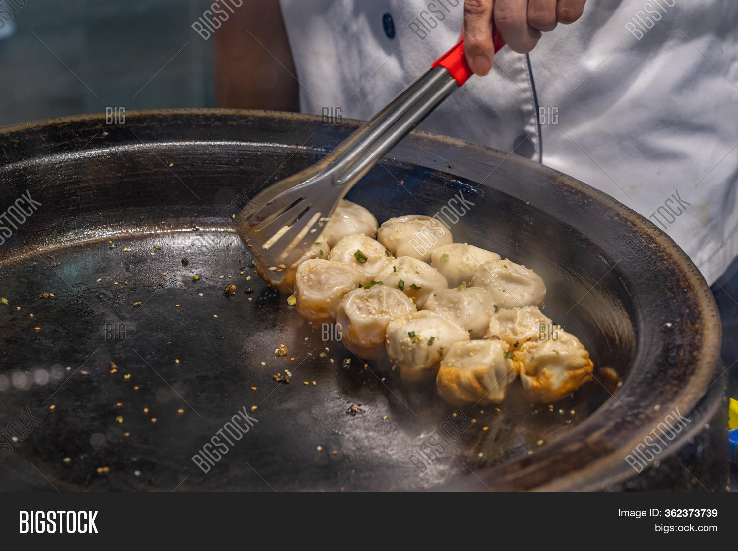 Chef Using Tongs While Image & Photo (Free Trial) Bigstock