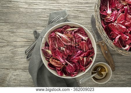 Healthy Red Lettuce Salad Meal On Wooden Table Background. Freshly Picked Radicchio
