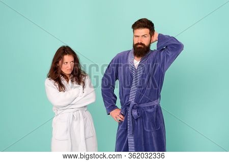 Divorce. Unhappy Couple In Love Blue Background. Sexy Woman And Bearded Man In Home Clothing. Confli