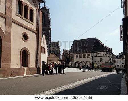 Selestat, France - Apr 15, 2019: Large Group Of People Gathering In Central Selstat Near The Bibliot