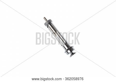 Retro Reusable Metal Syringe For Multiple Use, Closed. Isolated On White Background