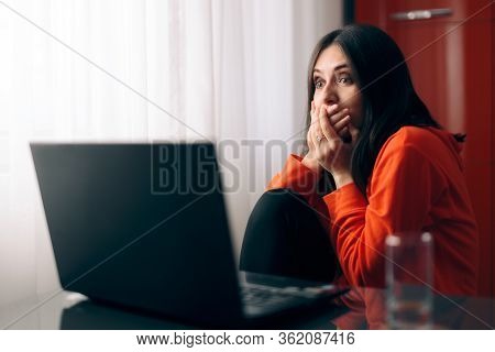 Shocked Woman Reacting To Reading Unbelievable News Online