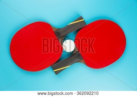 Set To Play Ping-pong On A Blue Background