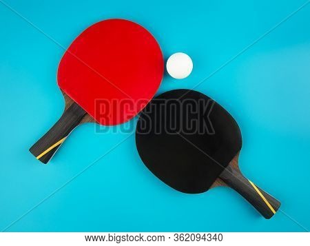 Set To Play Ping-pong On A Blue Background