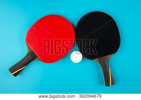Set To Play Ping-pong On A Blue Background