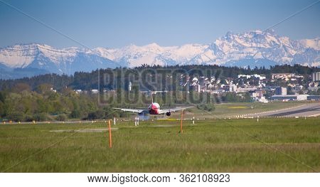 ZURICH - MAY 5: A-320 Air Berlin landing in Zurich airport after short haul flight on May 5, 2016 in Zurich, Switzerland.Zurich airport is home port for Swiss Air and one of the biggest european hubs.