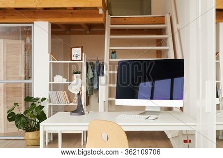 Background Image Of Contemporary Workplace In Two Level Office Apartment With Computer Desk In Foreg