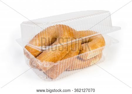 Rolls With Cottage Cheese And Jam Filling In The Form Of A Horseshoe In Partly Open Plastic Transpar