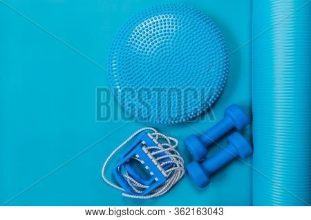 Set Of Vinyl Dumbbells, Chesty Expander And Massage Cushion On Exercise Yoga Mat At Home Or In Fitne