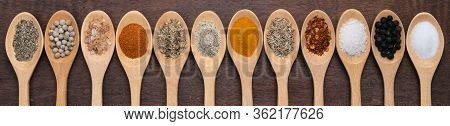 Various Spices In Wooden Spoon On Wood Table Background, Sugar, Pepper, Salt, Turmeric, Rosemary, Or