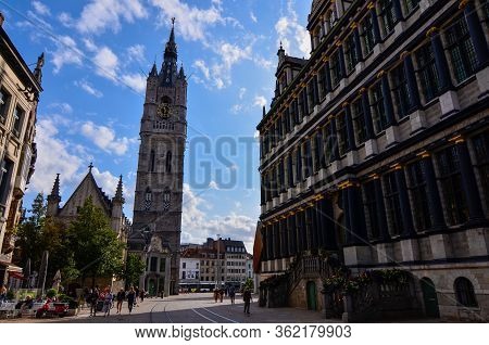 Ghent, Belgium, August 2019. The Imposing Bell Tower Called Beffroi, With Its Grandeur Stands Out Co