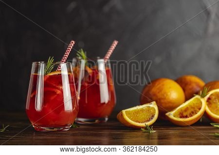 Two Glasses Of Campari Gin Spritz. Cocktail Of Sweet, A Touch Of Bitter From The Campari And Gorgeou