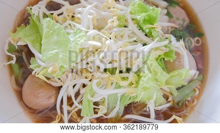 Noodles Thailand Food With Meat And Vegetables In White Large Bowl. Top View Healthy Food Delicious.