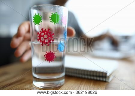 Hand Reaches For Glass Infected With Coronavirus. Acute Respiratory Infection With All Their Charact