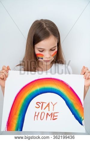 Little Girl With Blond Hair Drew A Rainbow And A Poster Stay Home. Flashmob Chasetherainbow.
