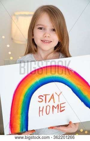 Child Girl With Blond Hair Drew A Rainbow And A Poster Stay Home. Flashmob Chasetherainbow.