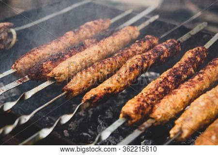 Bbq Beef Kebabs On A Hot Grill Closeup. Arabian And Iranian Kabab.