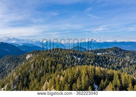 Aerial View Of Huge Valley Of The Mountains Of Italy, Trentino, Green Meadows, Slopes With Green Spr