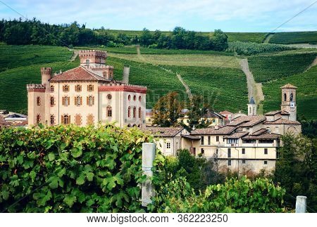 Panorama Of Barolo (piedmont, Italy) With The Town, The Medieval Castle And The Vineyards. Barolo Is