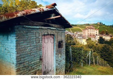 Panorama Of Barolo (piedmont, Italy) With The Town, The Medieval Castle And The Vineyards. Barolo Is