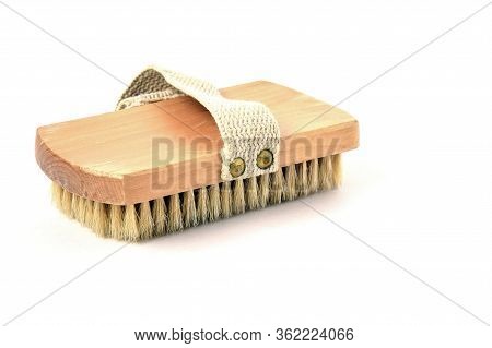 Beige Body Brush With Itater Handle On A White Background