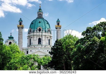 The Facade Of The Karlskirche (saint Charles Church) In Vienna, Austria, Seen From The Public Garden
