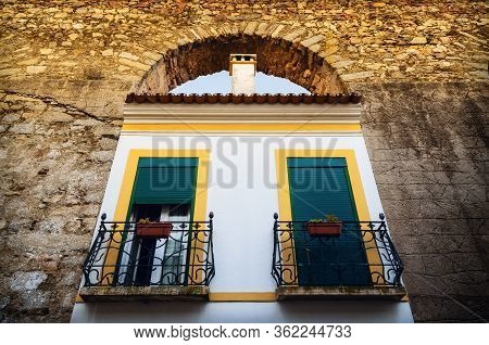 Houses In Evora (alentejo, Portugal) Along The Ancient Agua Da Prata Aqueduct. Buildings Were Built 