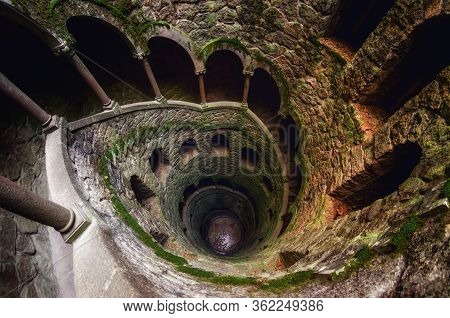 Sintra, Portugal - February 5 2019: The Famous Initiation Well Of The Quinta Da Regaleira, Masonic S