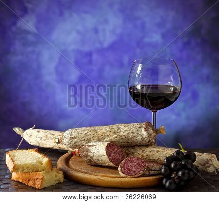 Salumi And Glass Of Red Wine