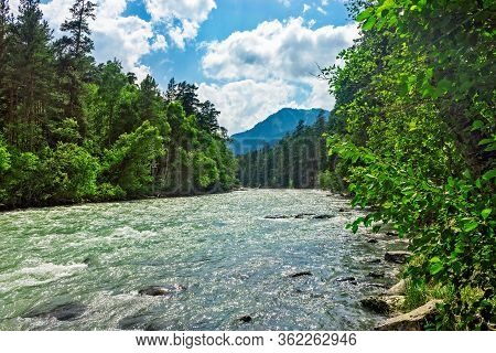 Bolshoy Zelenchuk River In The Caucasus Mountains On A Sunny Day
