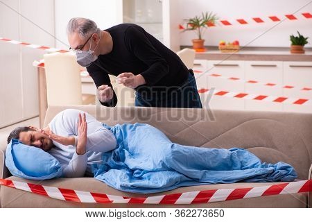 Father and son in coronavirus disease concept at home