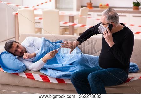 Father and son in coronavirus disease concept at home