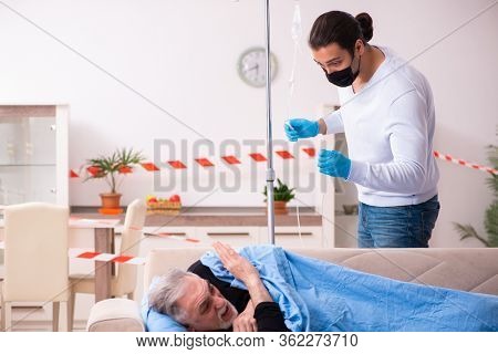 Father and son in coronavirus disease concept at home