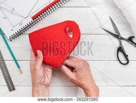 Female Hands Hold A Home-made Antiviral Mask During Isolation And Outbreak Of The Virus. Step-by-ste