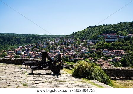 Medieval Weapons In Tsarevets Fortress. Beautiful Veliko Tarnovo Town Seen From The Fortress, Bulgar