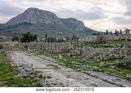 Archaological Site Of Corinth After Sunset In Greece, Europe