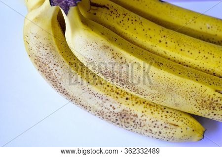 A Banana Is An Elongated, Edible Fruit - Botanically A Berry - Produced By Several Kinds Of Large He