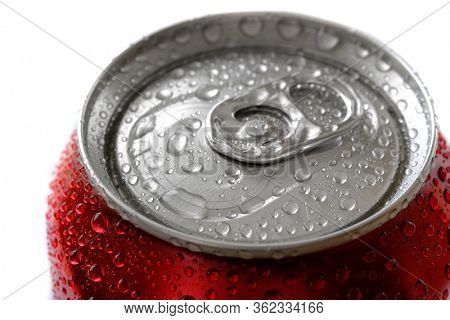 Fresh can of soda pop soft drink with water drops chilled and refreshing