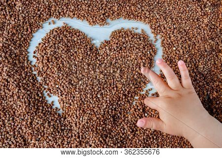 Buckwheat Background With Drawn Heart. Gluten Free And Healthy Diet. Shallow Depth Of Field Texture.