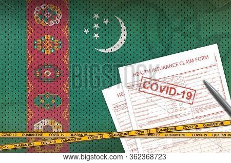 Turkmenistan Flag And Health Insurance Claim Form With Covid-19 Stamp. Coronavirus Or 2019-ncov Viru