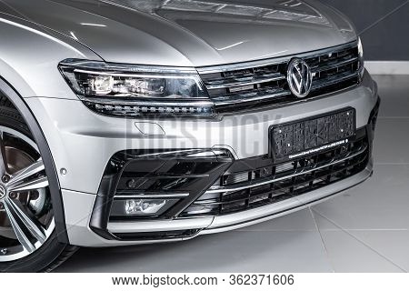 Novosibirsk/ Russia - March 15 2020: Volkswagen  Tiguan, Close-up Of The Headlight, Bumper, Wheel, L