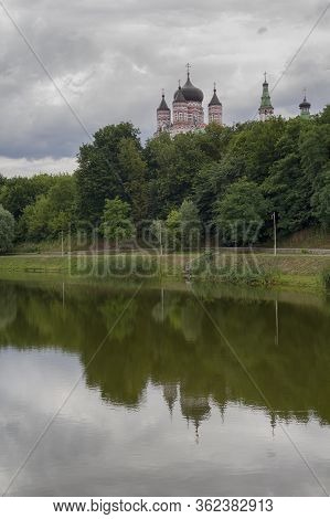 Domes Of The Monastery Are Reflected In The Lake Of Theophany Park. Kiev, Ukraine