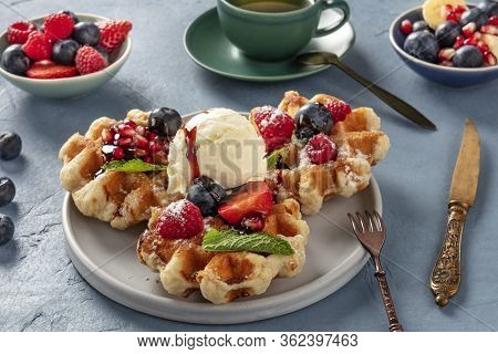 Waffles With Fresh Fruit, Chocolate, Caramel, And Ice-cream