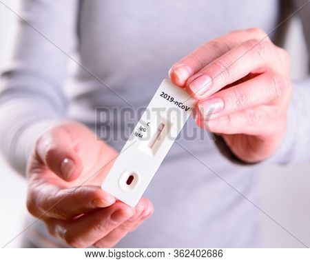 Rapid Covid-19 Coronavirus Strip Test Cassette For Antibody Or Sars-cov-2 Virus Disease In Hands Epi