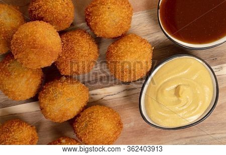 Dutch Traditional Snack Bitterbal On A Serving Board, Isolated