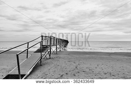 Sea view with rerspective of pier - Black and white landscape - seascape